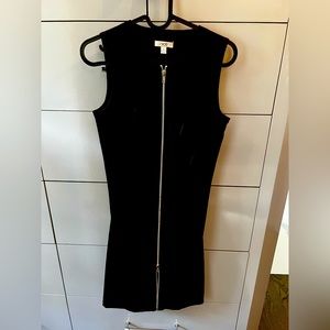 Fitted zipper front all the way up and down dress. So stinkin sexy!